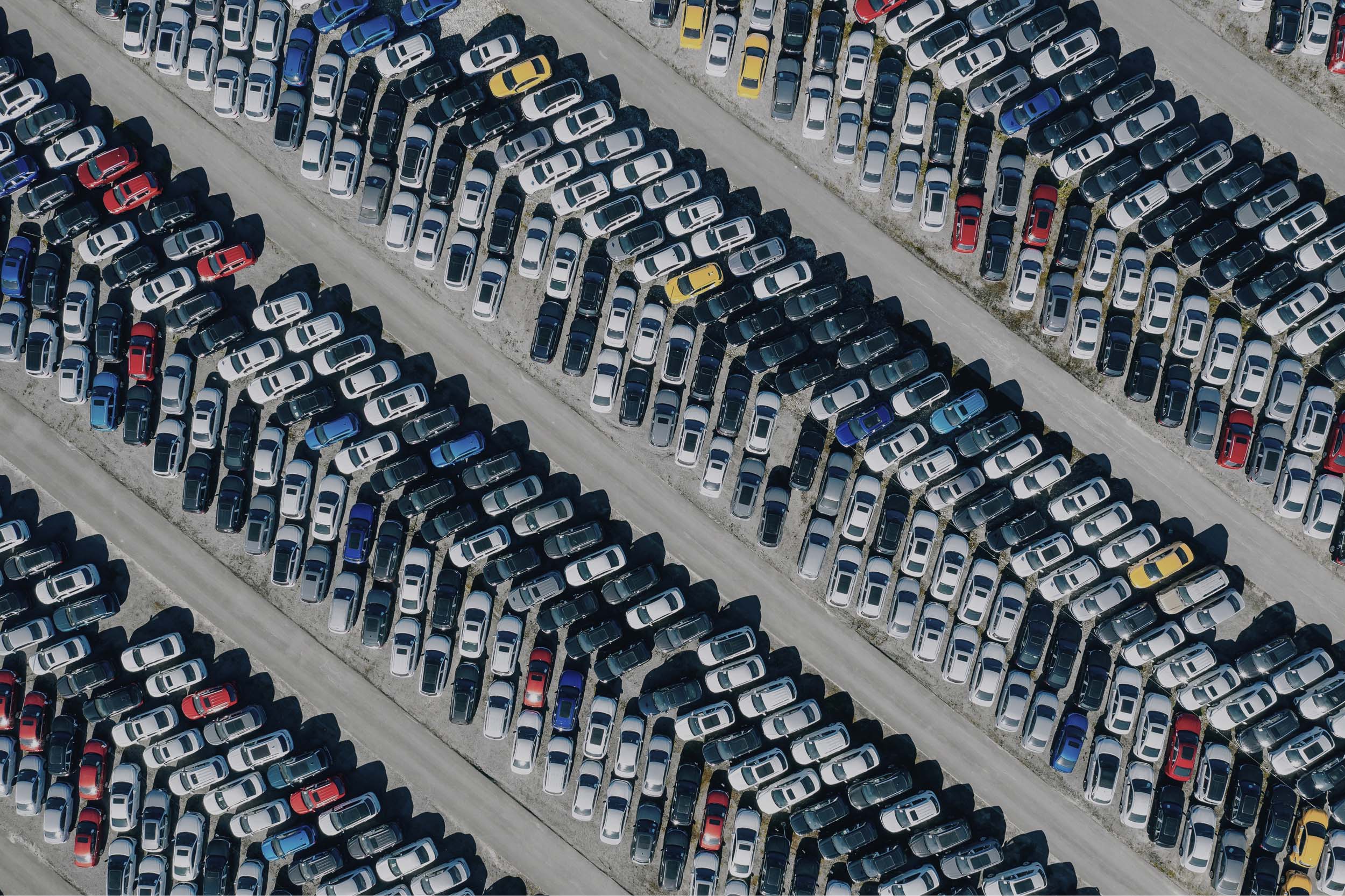 Lineup of cars in a parking lot in horizontal lines