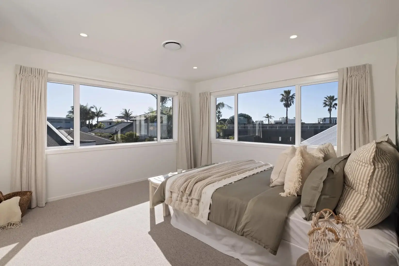 An image of a Papamoa bedroom with ducted air conditioning installed