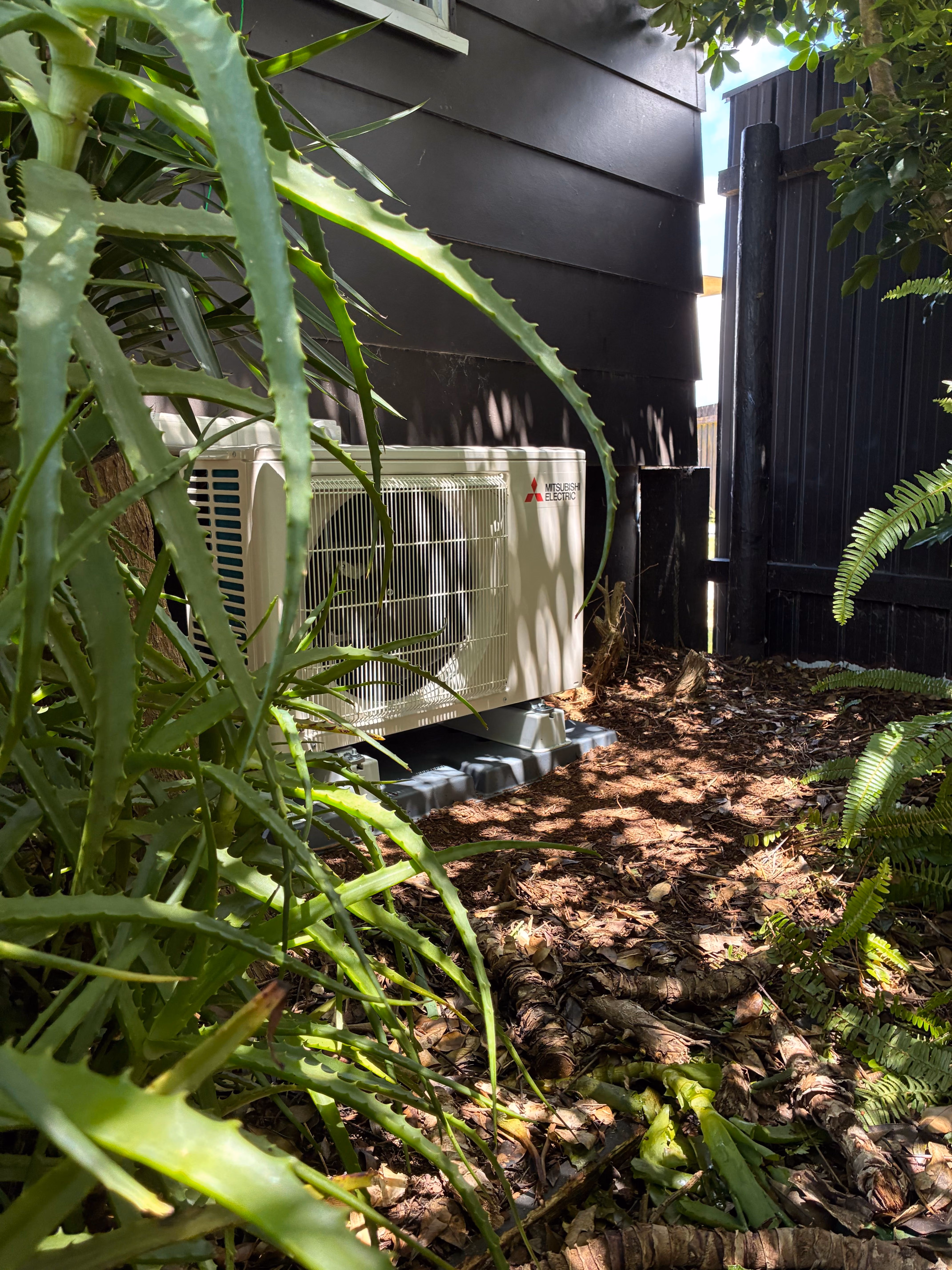 an image on an AP25 outdoor unit installed in a garden