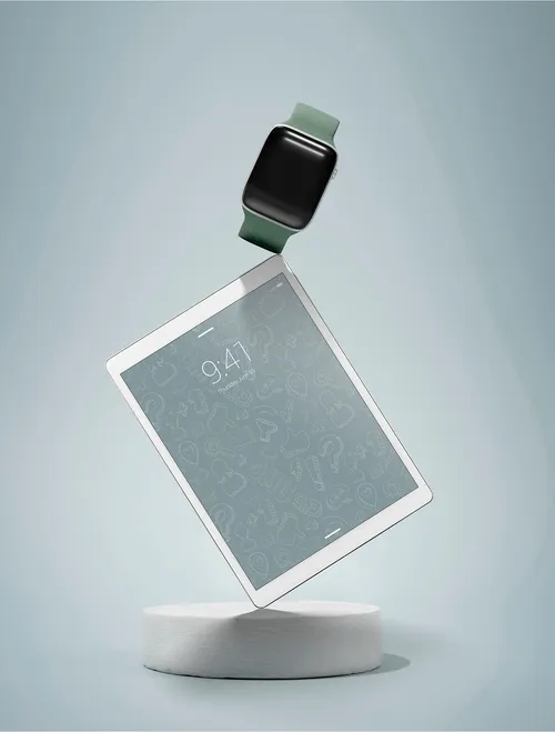 Floating tablet and smartwatch mockup with green strap, displayed above a white cylindrical stand on a light blue background.