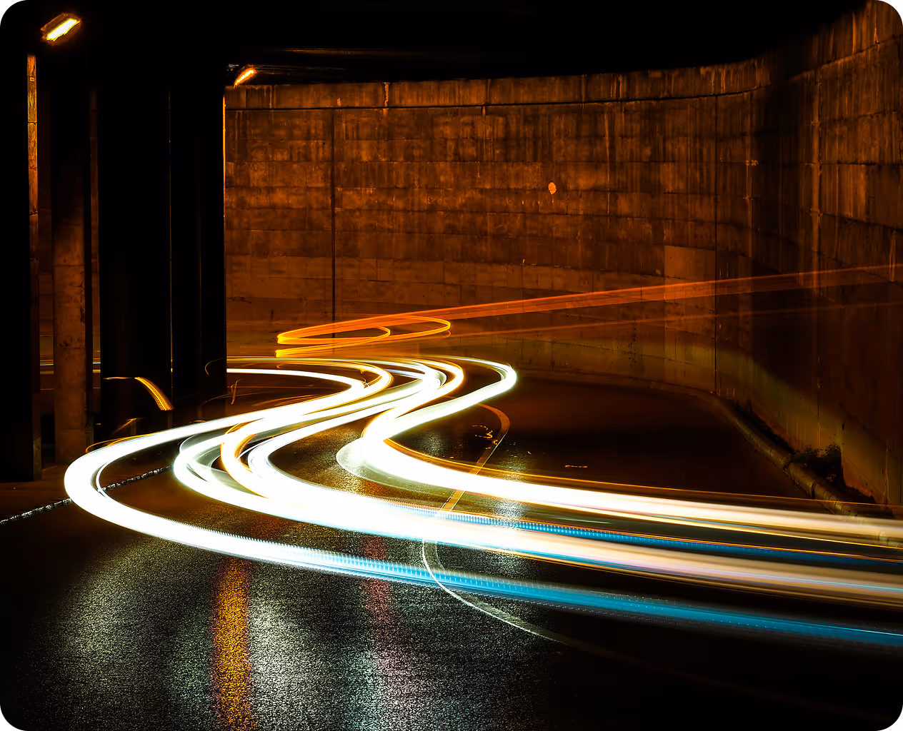 A blurry photo of a city street at night.