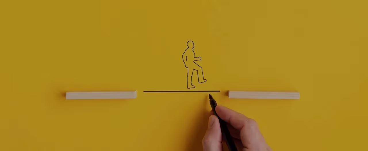 A hand drawing a line of a personDescription automatically generated