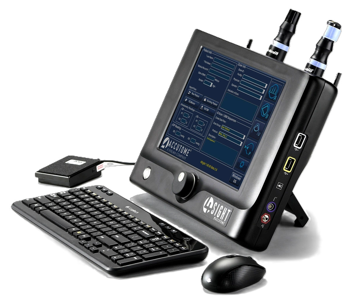 Medical diagnostic device touchscreen with attached keyboard and mouse, displaying patient exam info and interface labeled Accutome 4Sight.
