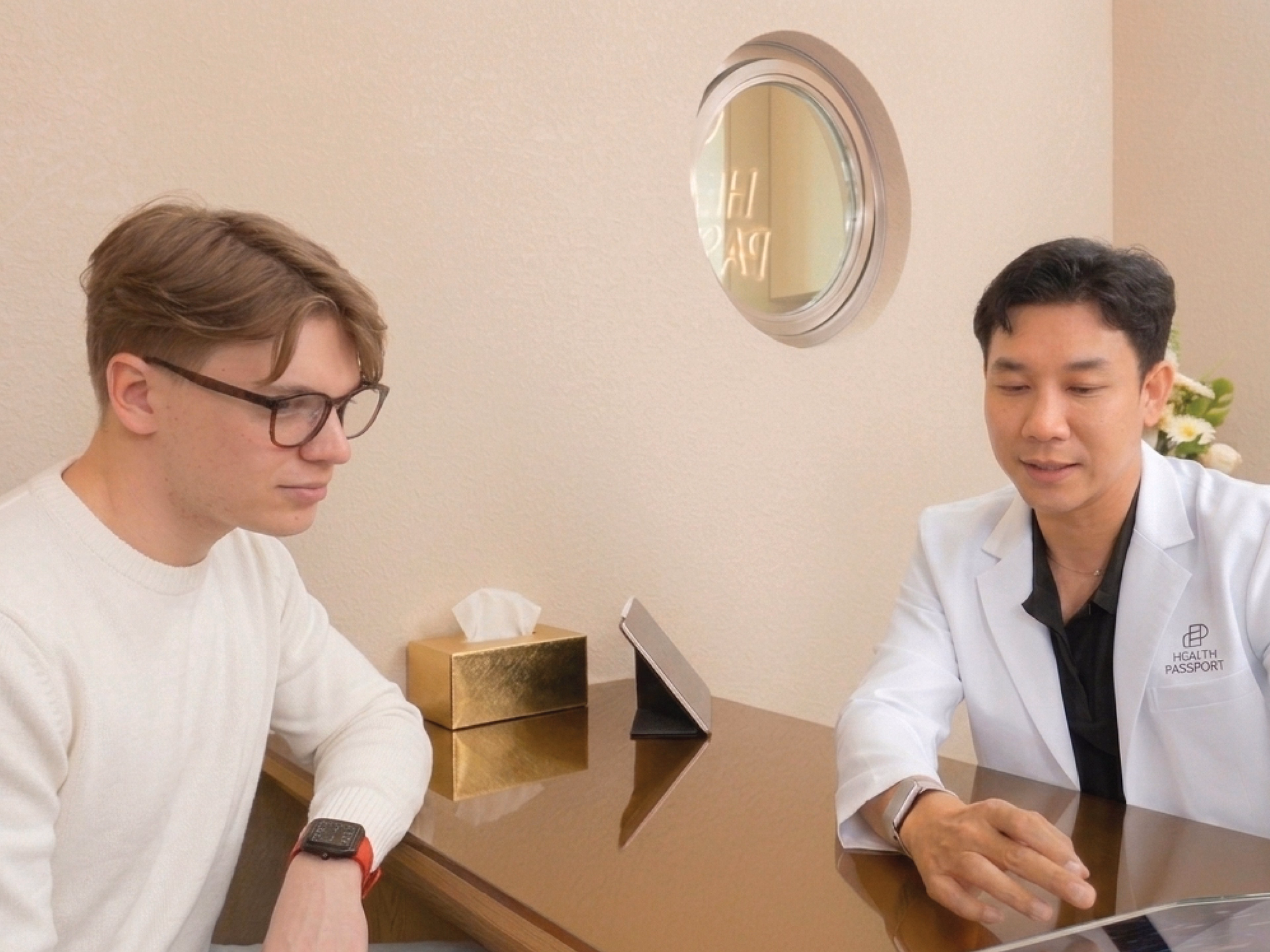 Patient consulting with a physician to review personalized treatment recommendations at Health Passport Bangkok.