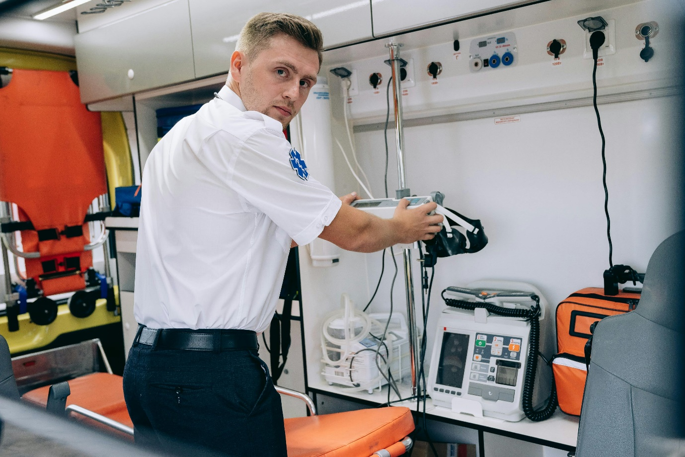 A medical assistant is working in a well-decorated modern tech-savvy diagnostic centre
