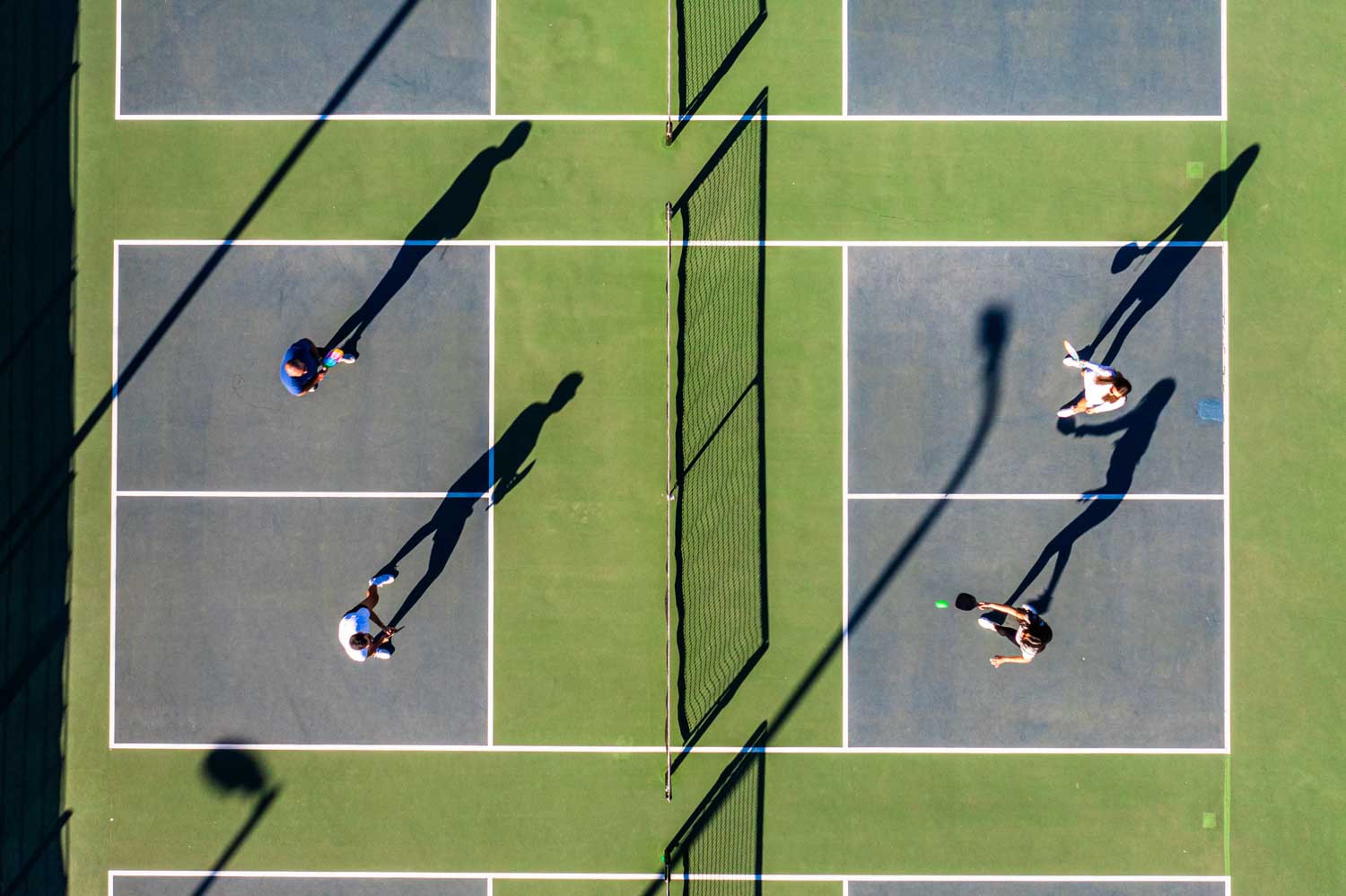Players lined up on court before a team match