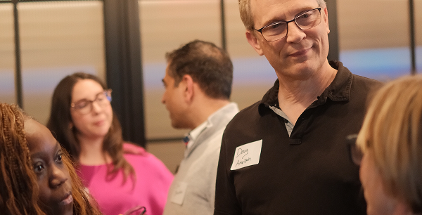 Group of startup founders networking during a Gild event