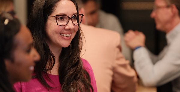 Group of startup founders networking during a Gild event