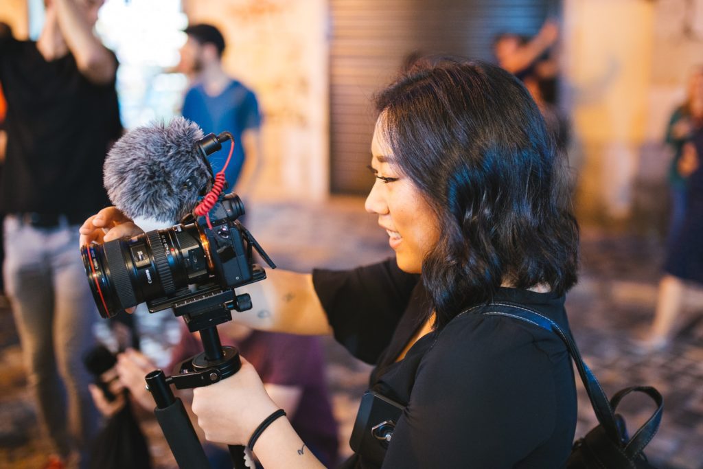 professional videographer with equipment