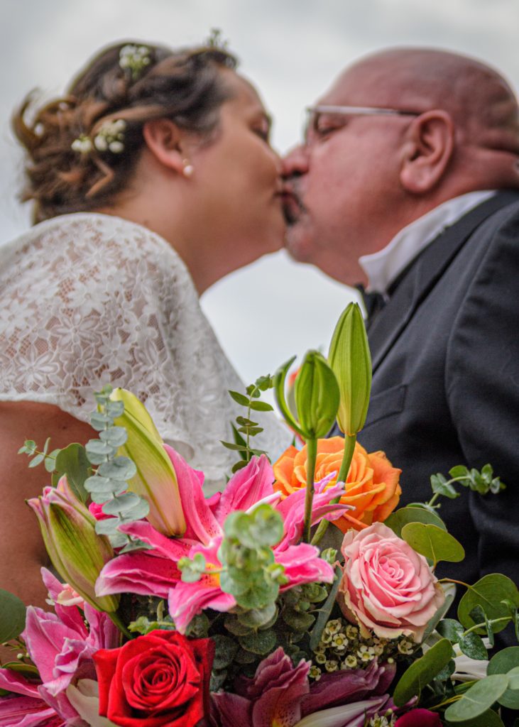 summer flowers on a beach wedding