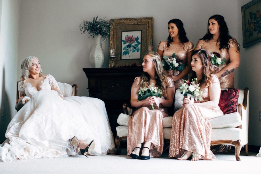 bride with her bridesmaids