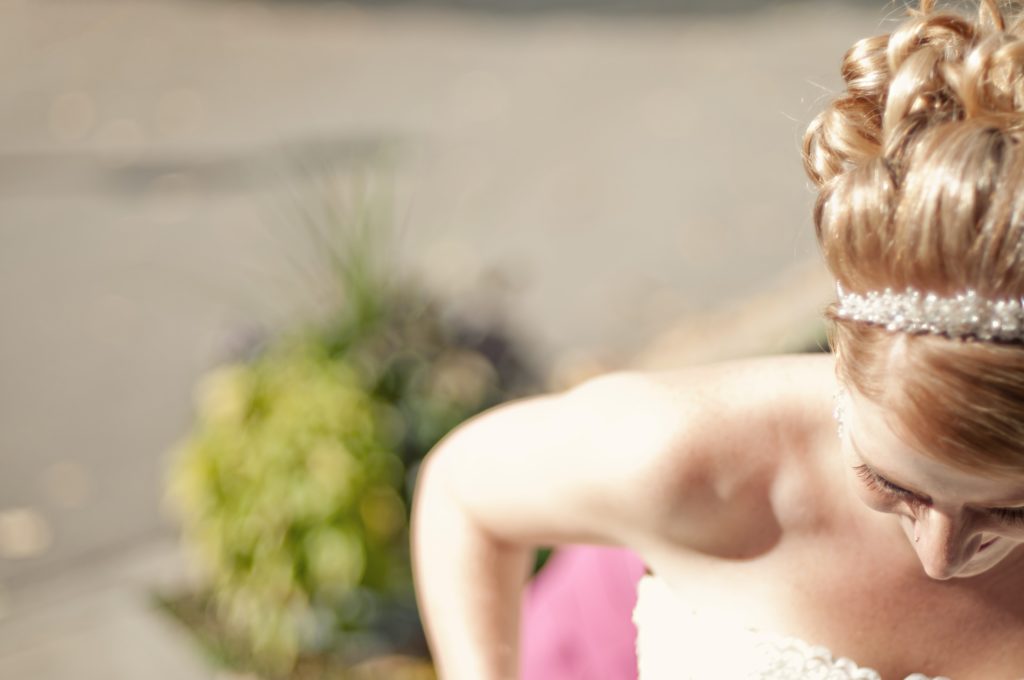 wedding hair updo with a headband accessory