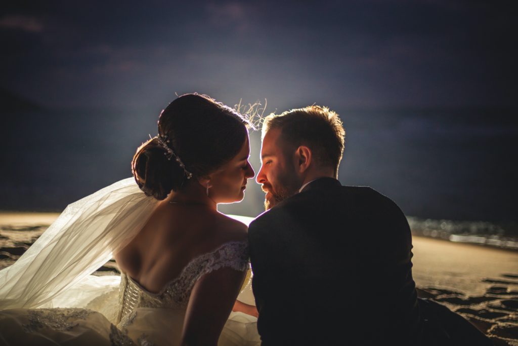 couple kissing at night ready for Address Estate Planning In their Prenup