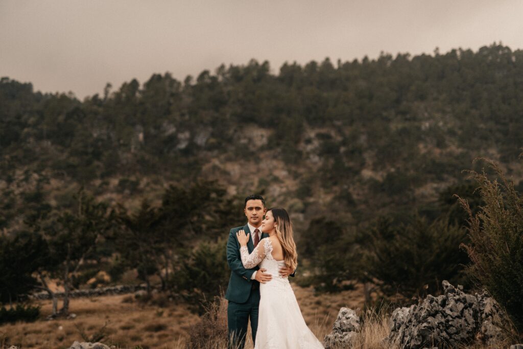 North Dakota Premarital Agreements couple in front a beautiful mountain in North Dakota