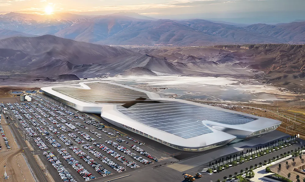 A large white building with a solar panel roof.