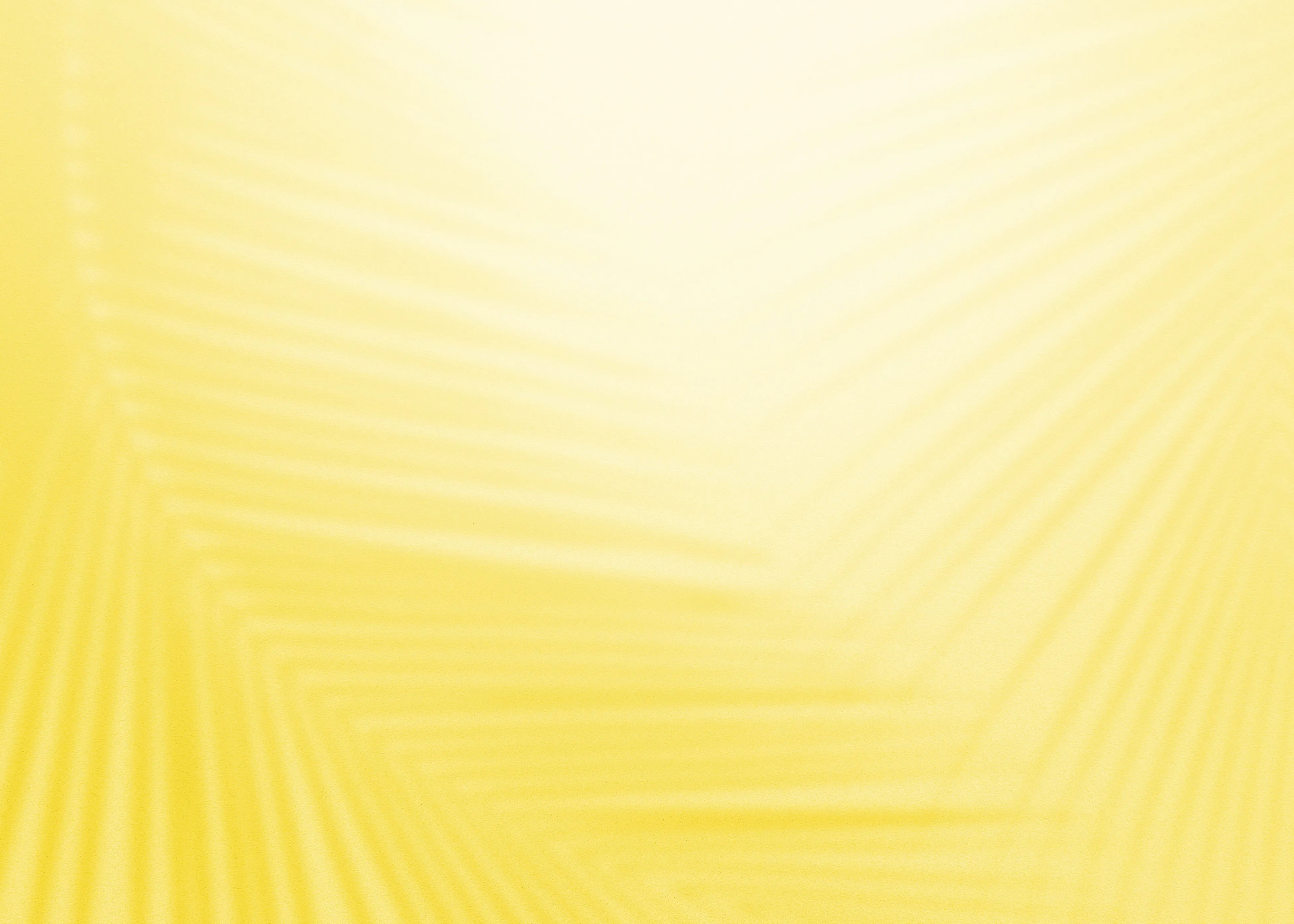 A blurry photo of a banana on a yellow background.