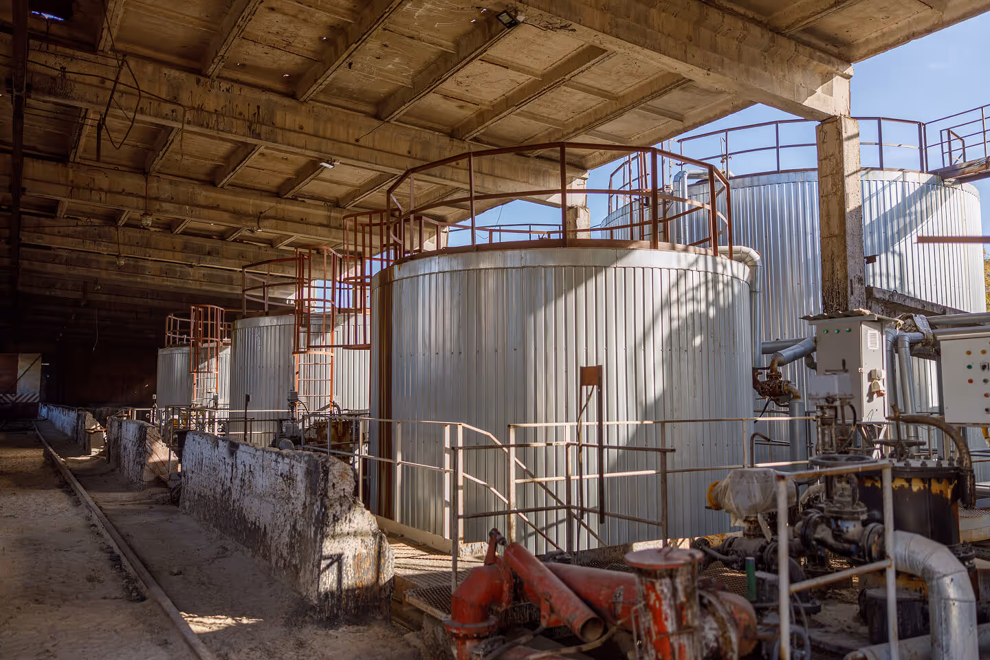 industrial-building-with-storage-cylinders-at-fact-2024-10-18-08-15-16-utc