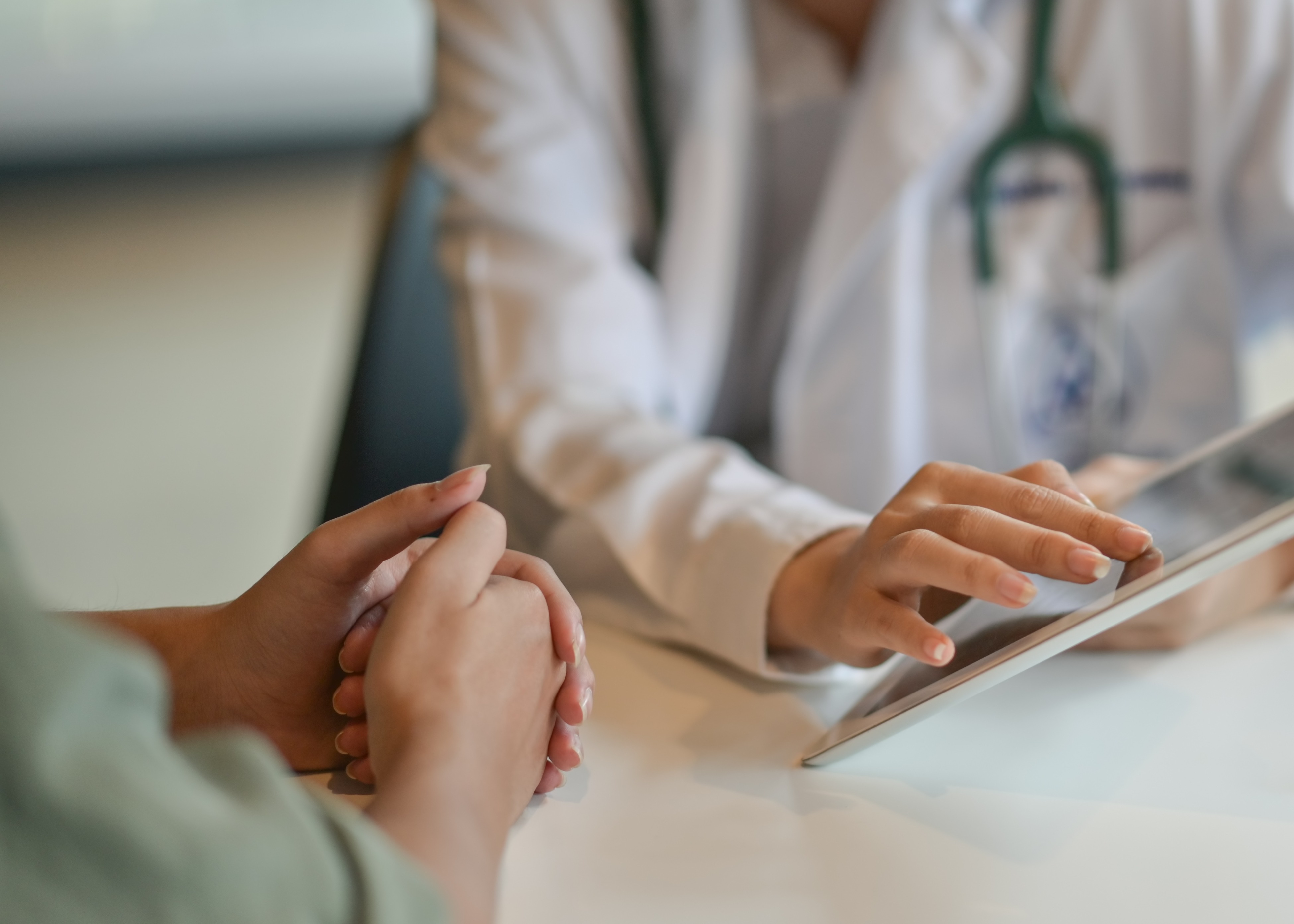 A doctor talking to a patient