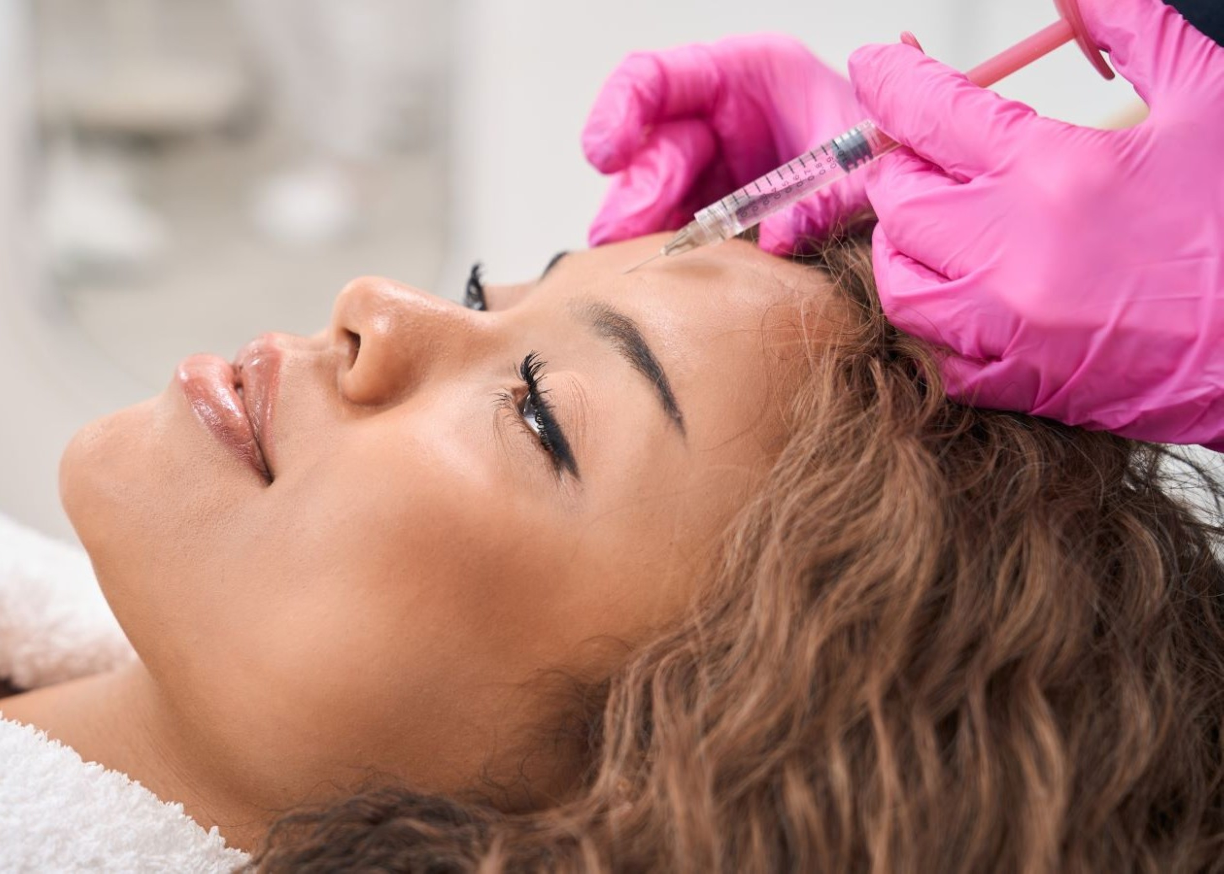 A woman getting Botox injections