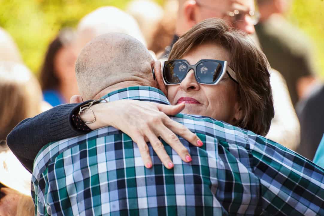 People hugging at Richfield Community Church in Yorba Linda, California