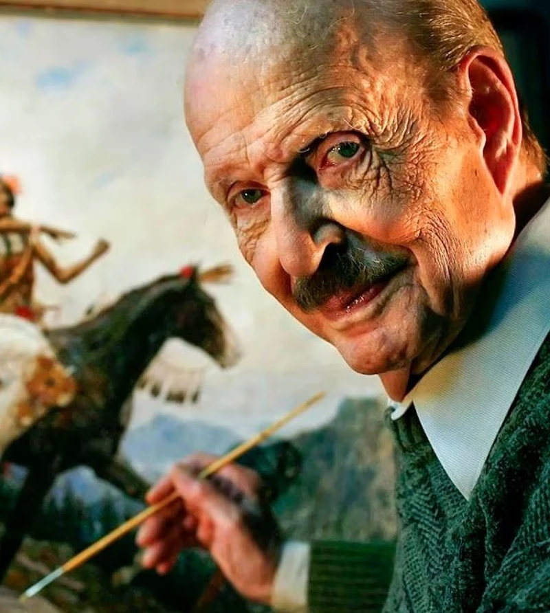 A man holding a paintbrush