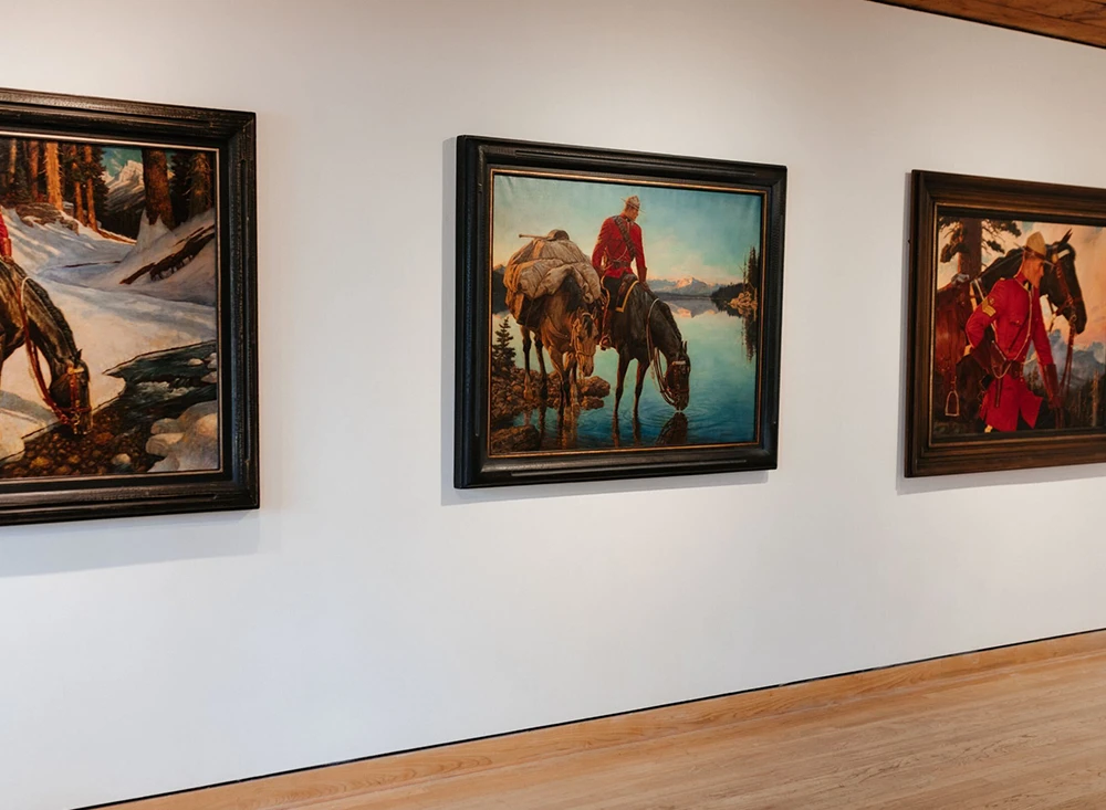Paintings on a wall in a gallery