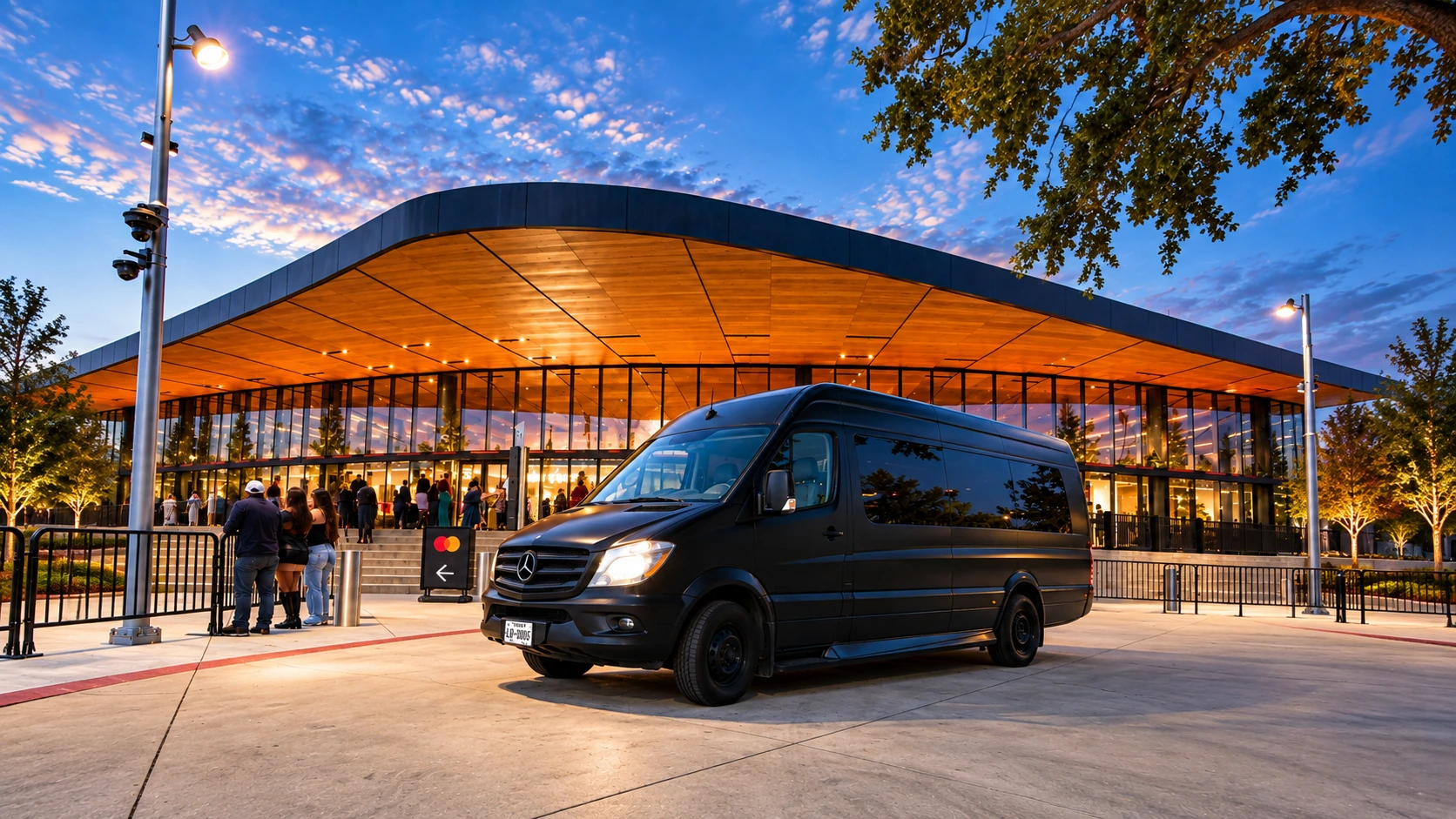 VANTA BLK matte black Mercedes-Benz Sprinter outside an event venue