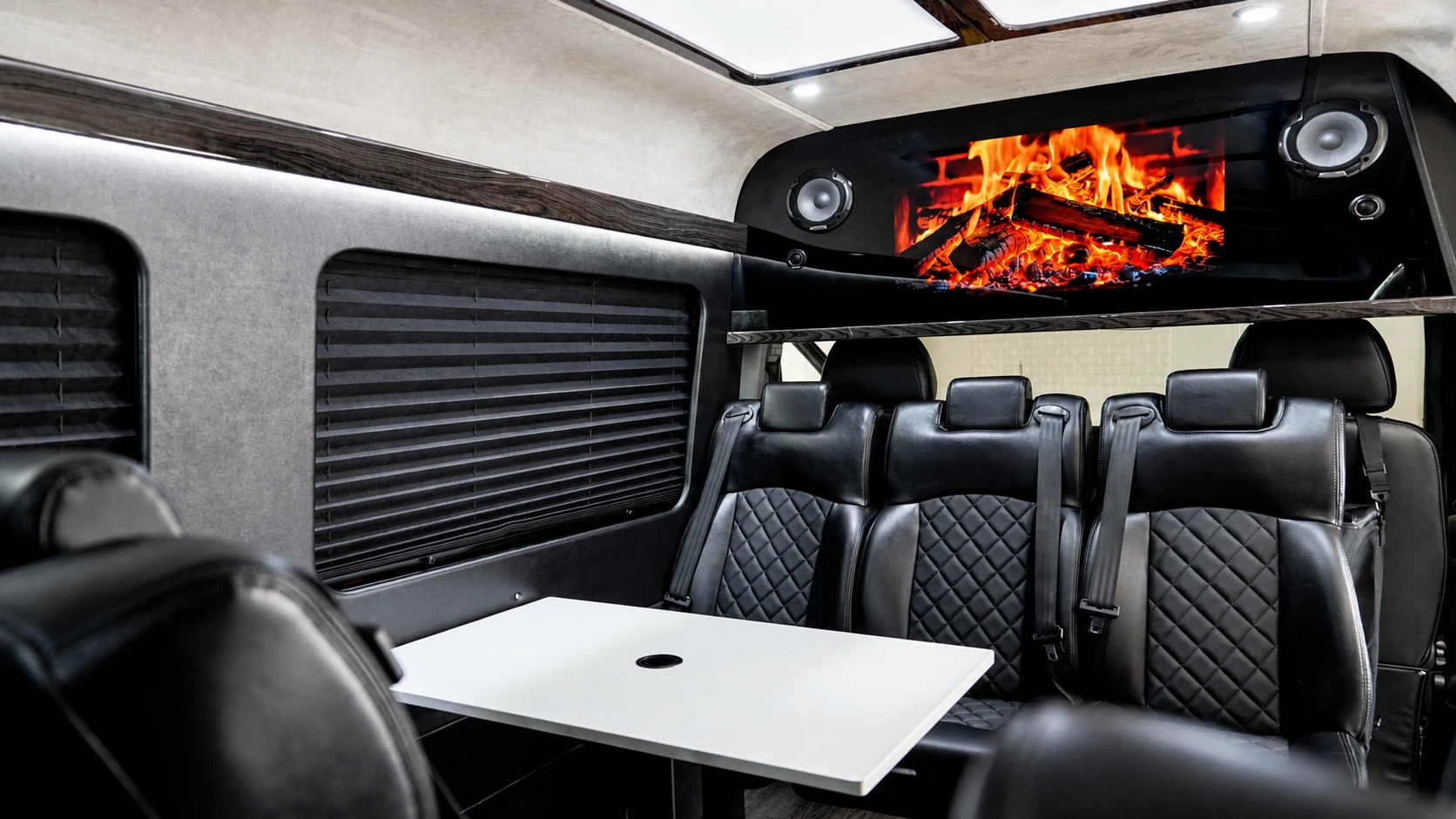 VANTA BLK Sprinter interior with leather seating and entertainment
