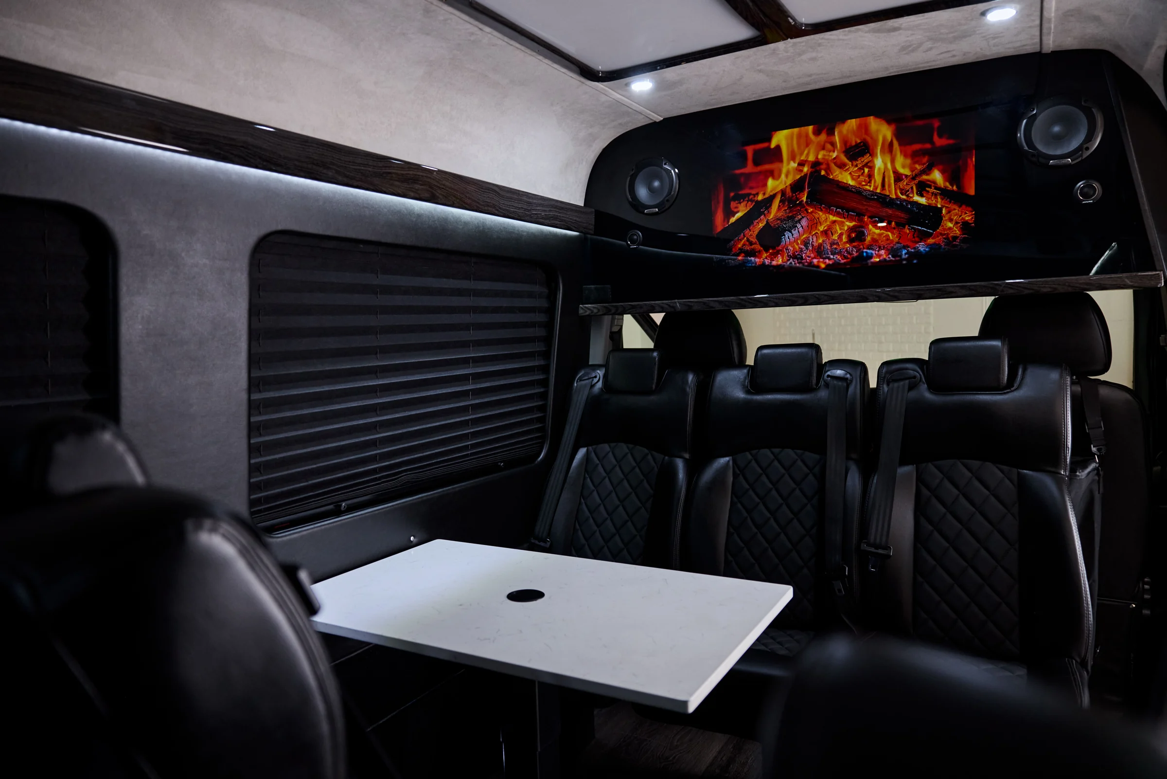 VANTA BLK Sprinter cabin with executive leather seating and entertainment