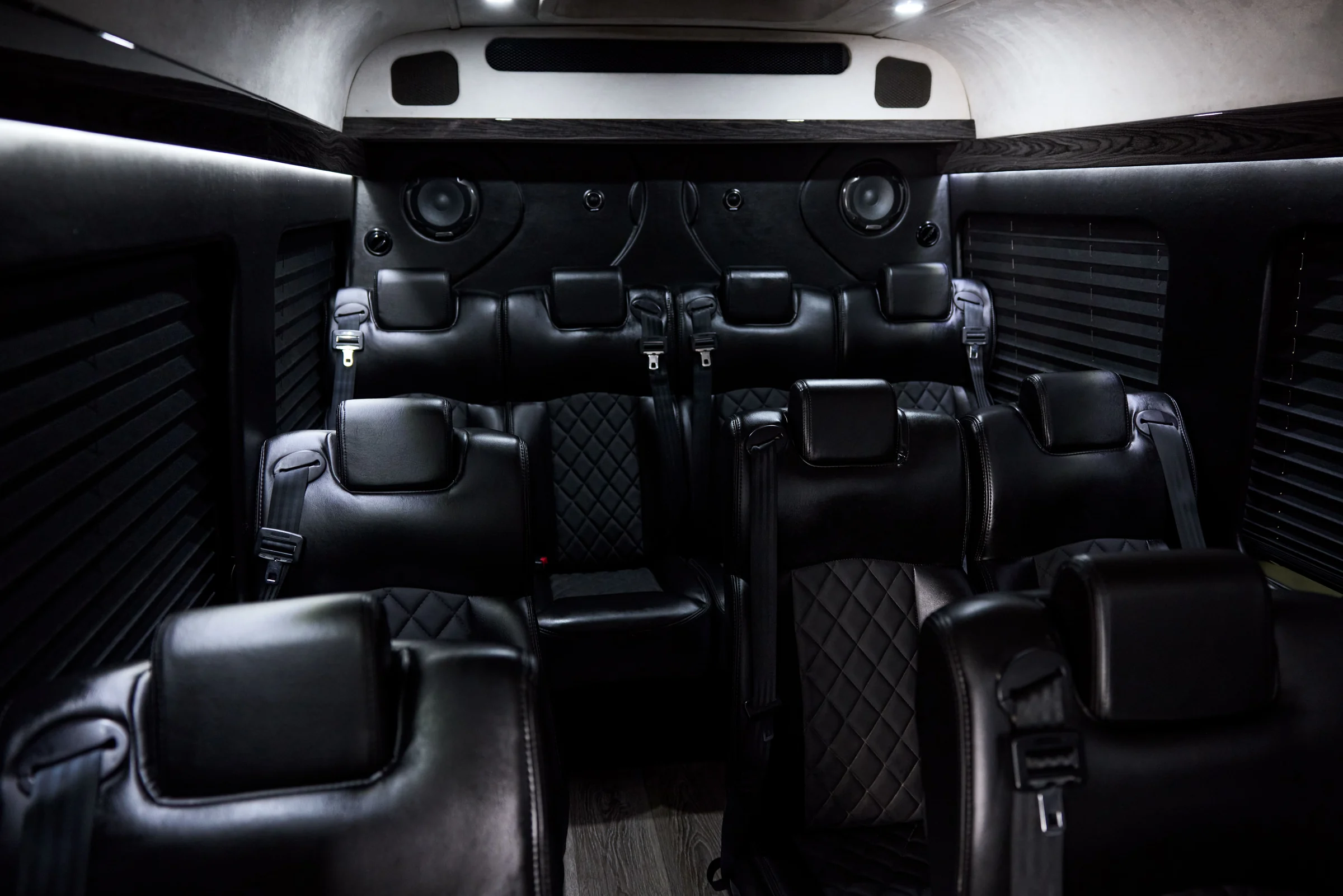 VANTA BLK Mercedes-Benz Sprinter interior with black leather passenger seating