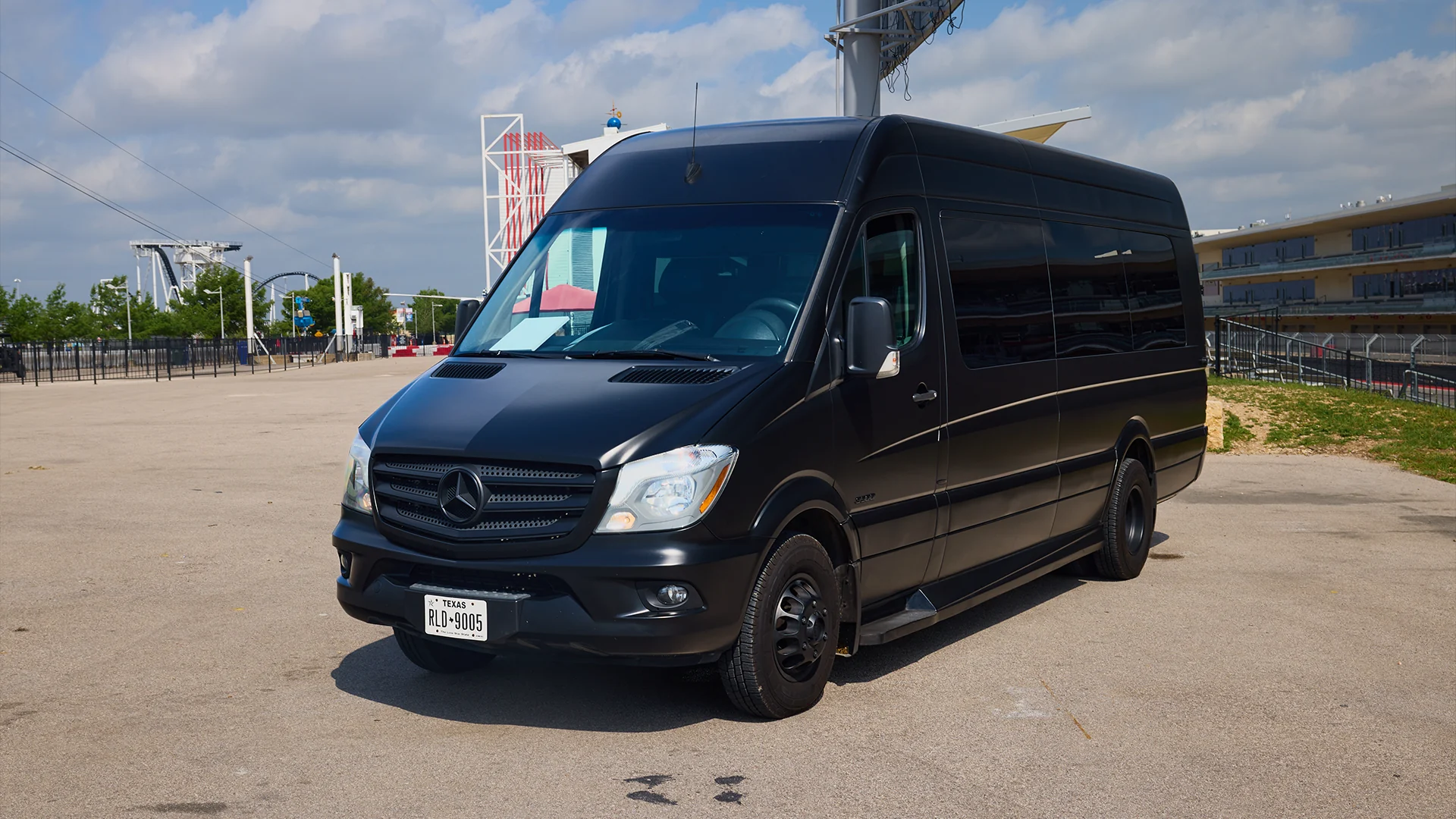 VANTA BLK matte black Mercedes-Benz Sprinter parked in Austin