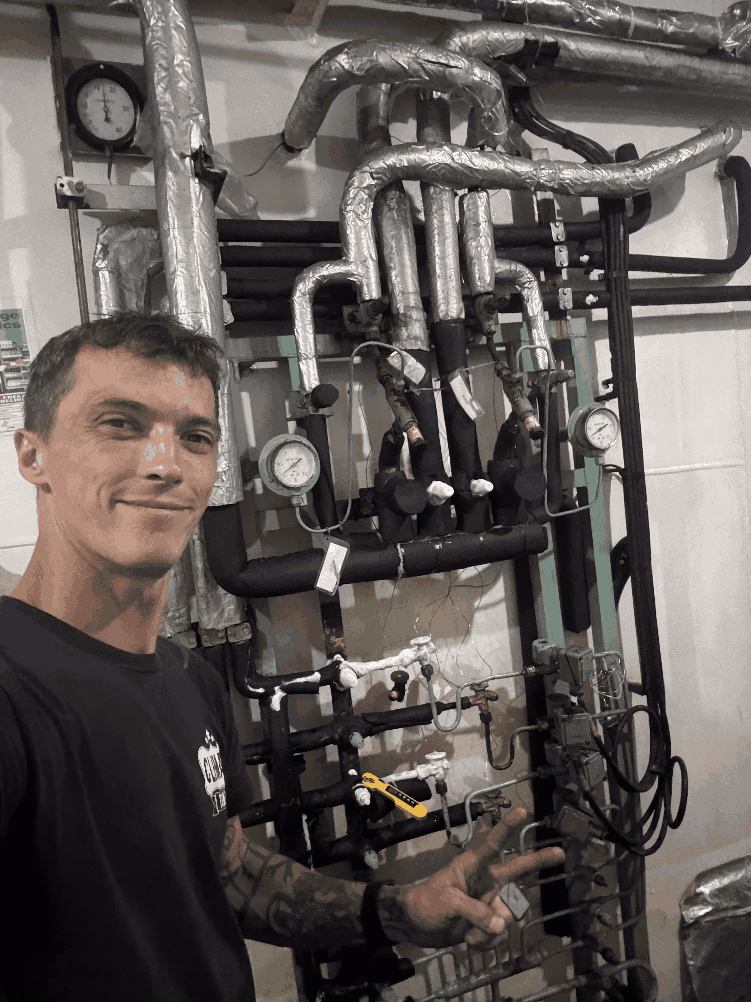 A man standing in front of a machine.