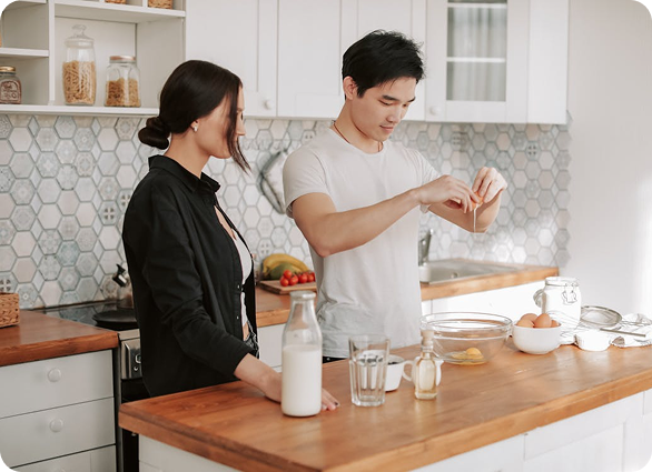 A young couple prepares to make dinner together