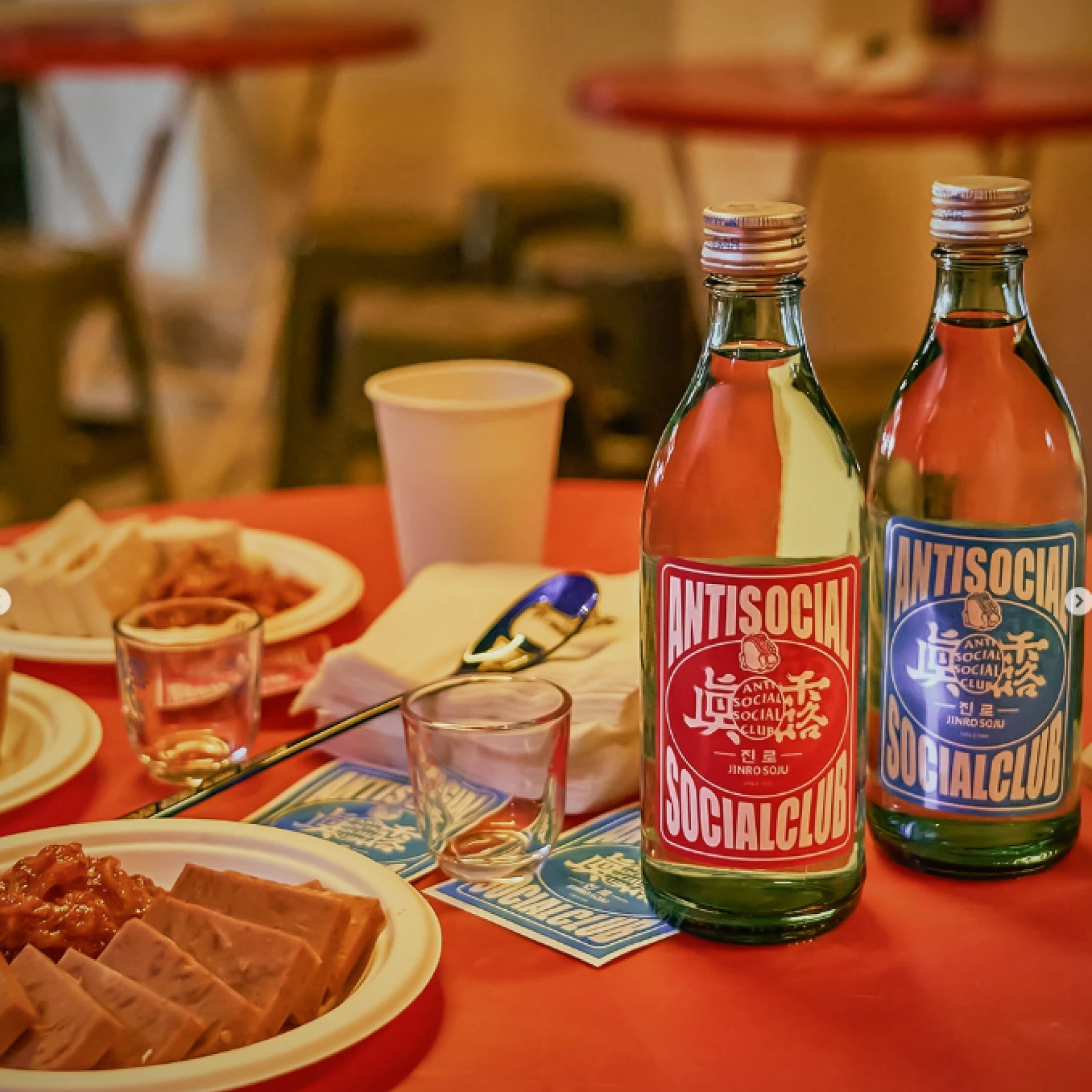 Antisocial Social Club x Jinro soju bottles on dining table