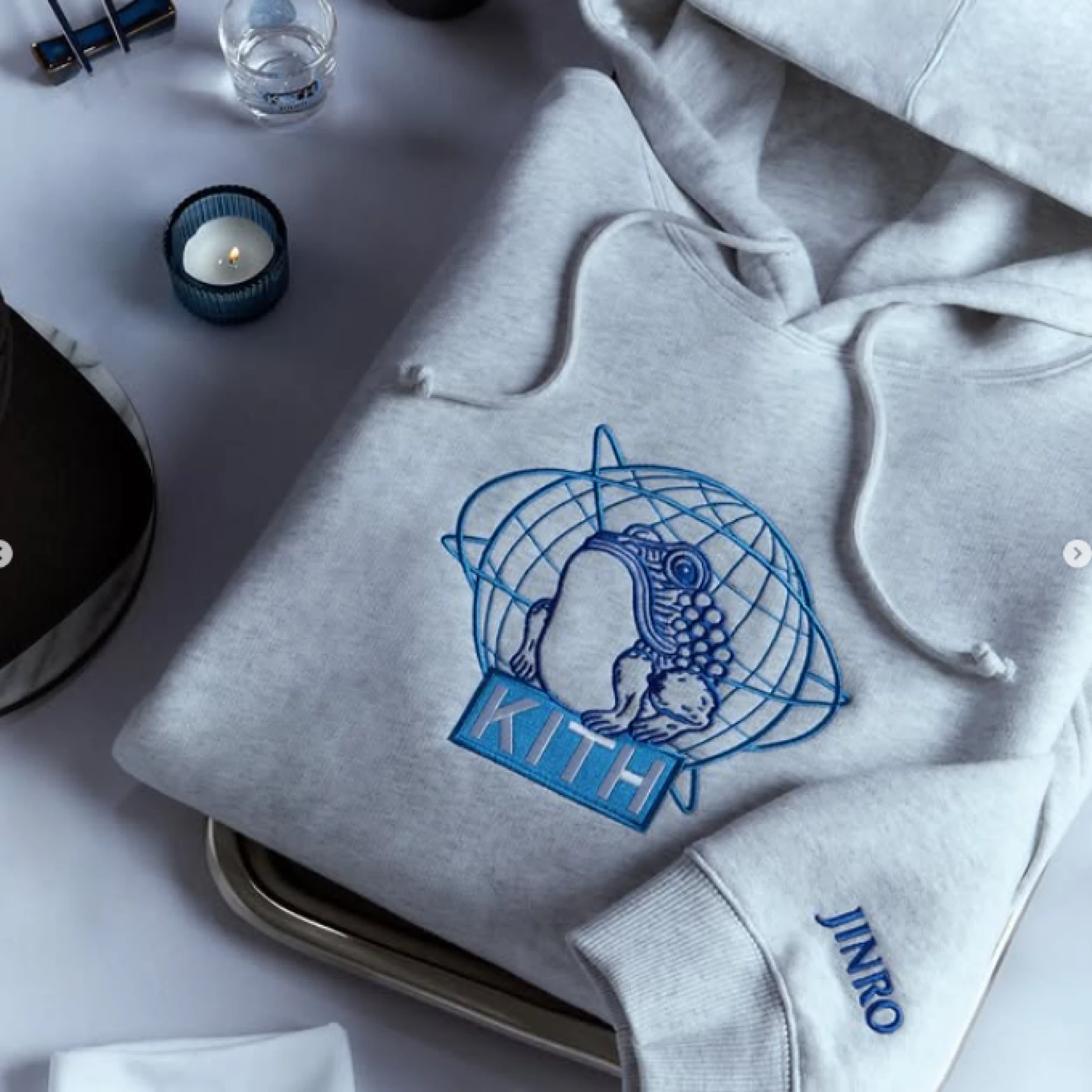 Gray Kith x Jinro hoodie with blue frog logo
