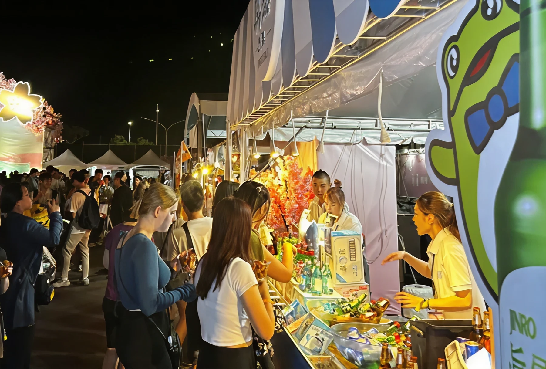 Crowd at JINRO night booth.