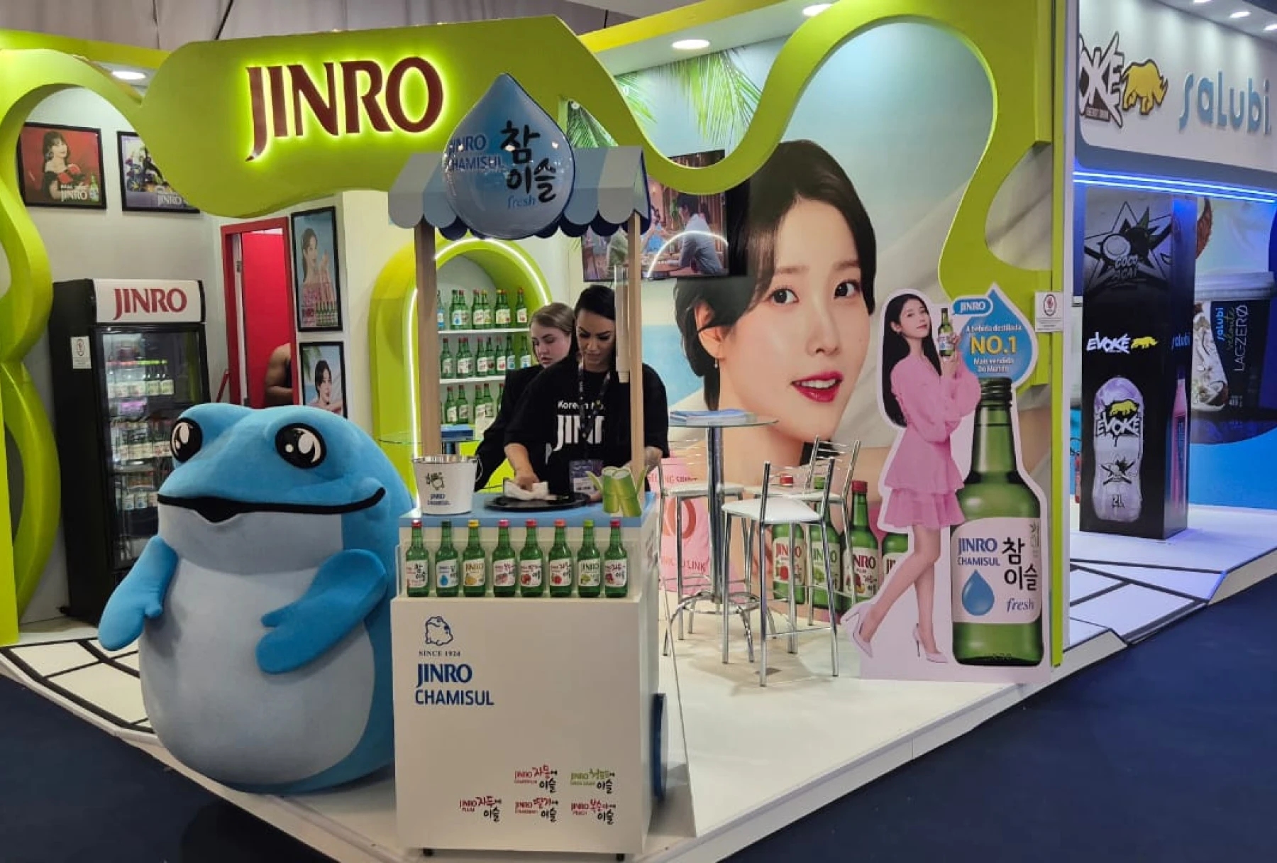 JINRO booth display with mascot and product showcase.