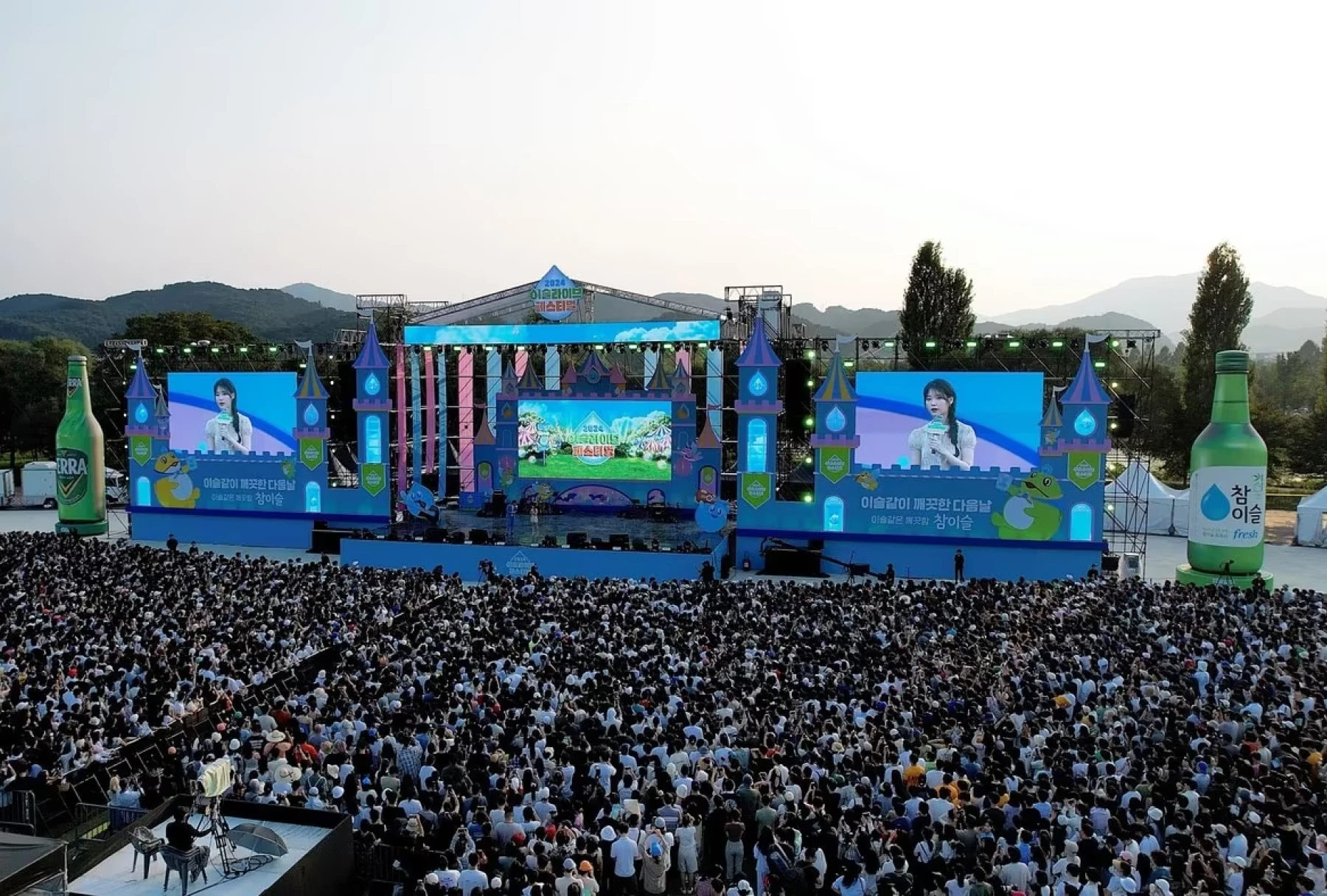 Large crowd at a JINRO outdoor festival.