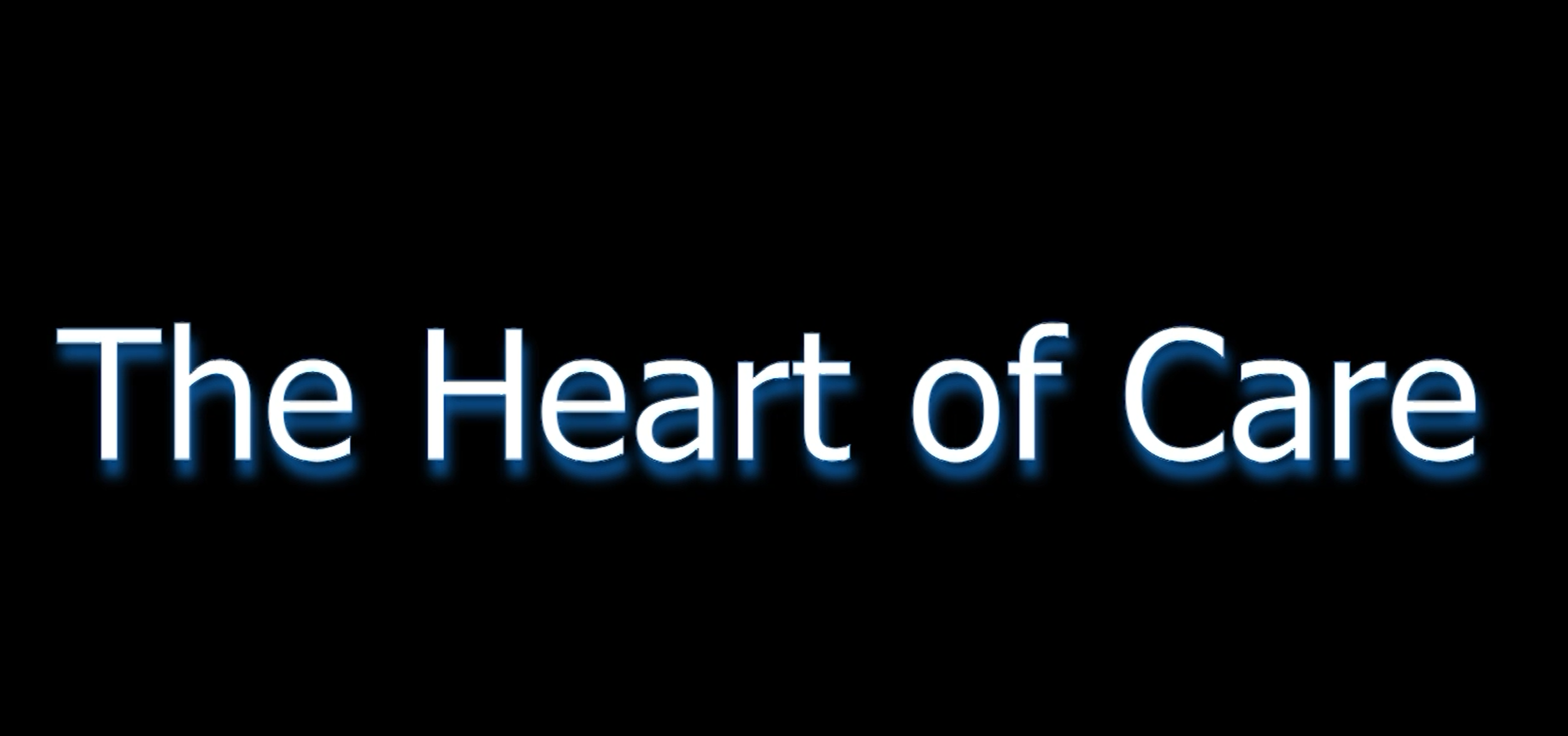 Text reading 'The Heart of Care' in white letters with a blue glow on a black background.