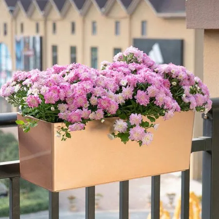 Railing planter mounted on a balcony showing bracket fit