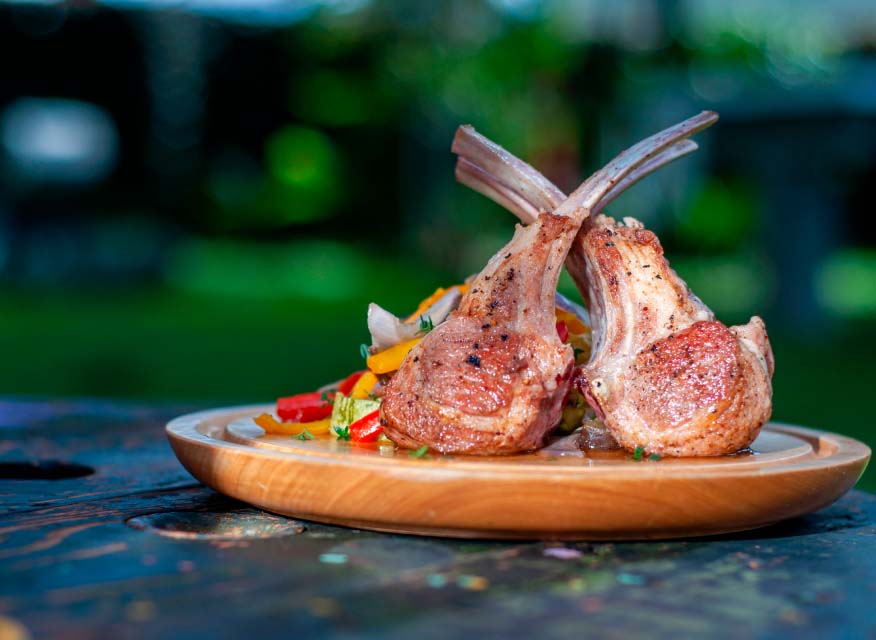 Lamb chops with mushroom & pea fricasse and brown butter aioli