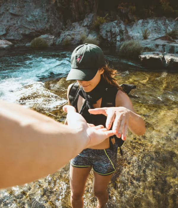 a hand reaching out and helping someone