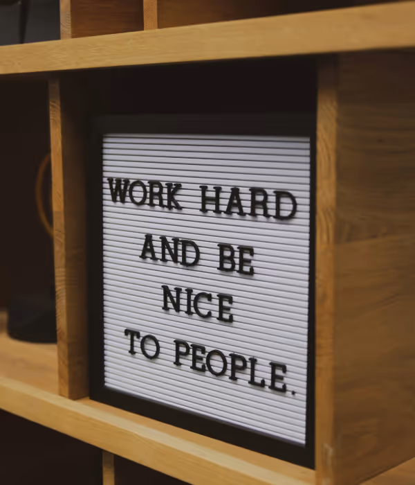 a box saying word hard and be nice to people