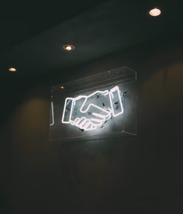 a neon handshake