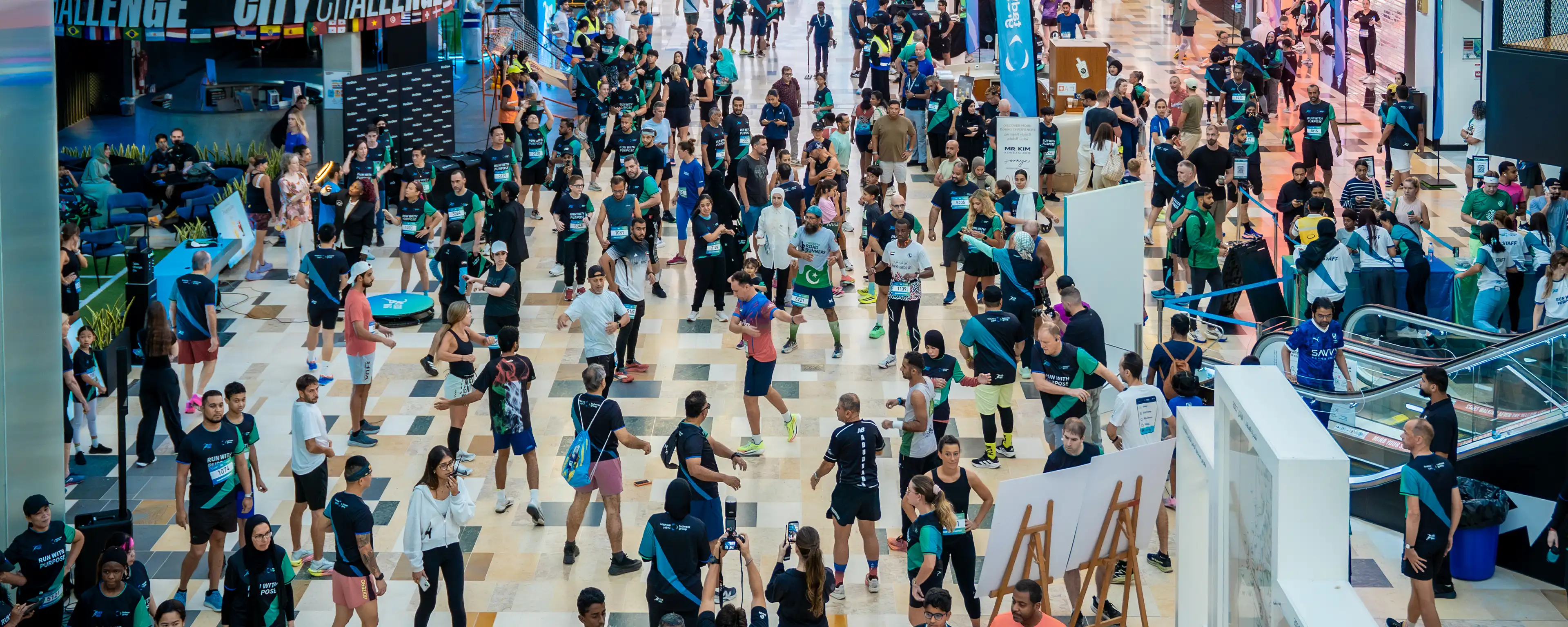 Runners gathering at a previous EcoRun starting line