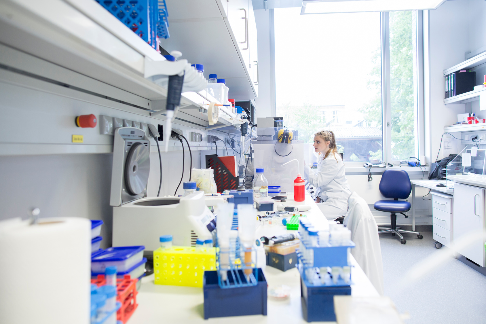 Two people in a lab working on a project.