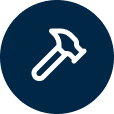 White hammer icon inside a dark blue circle.
