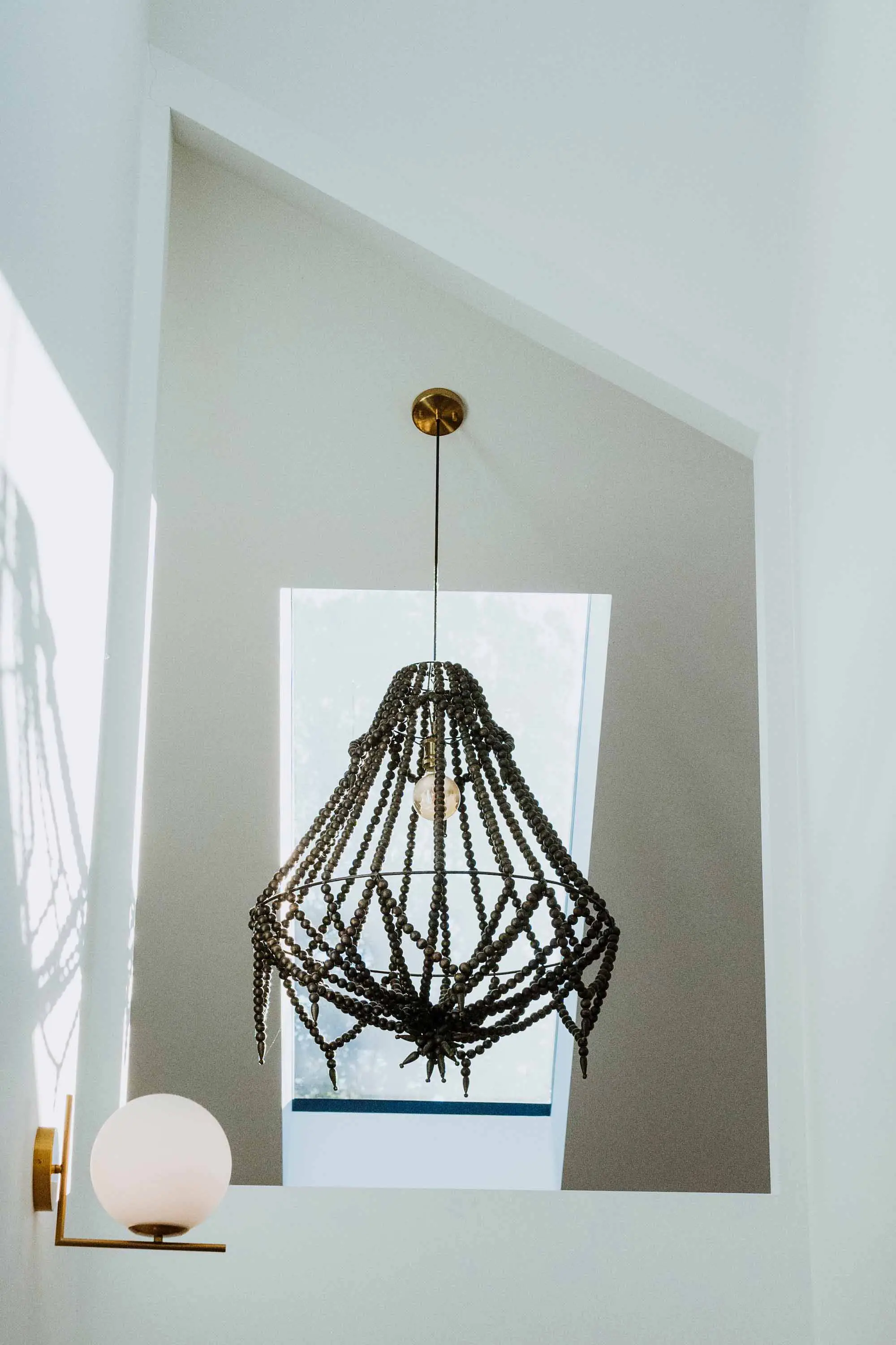 Hanging modern light in new build home