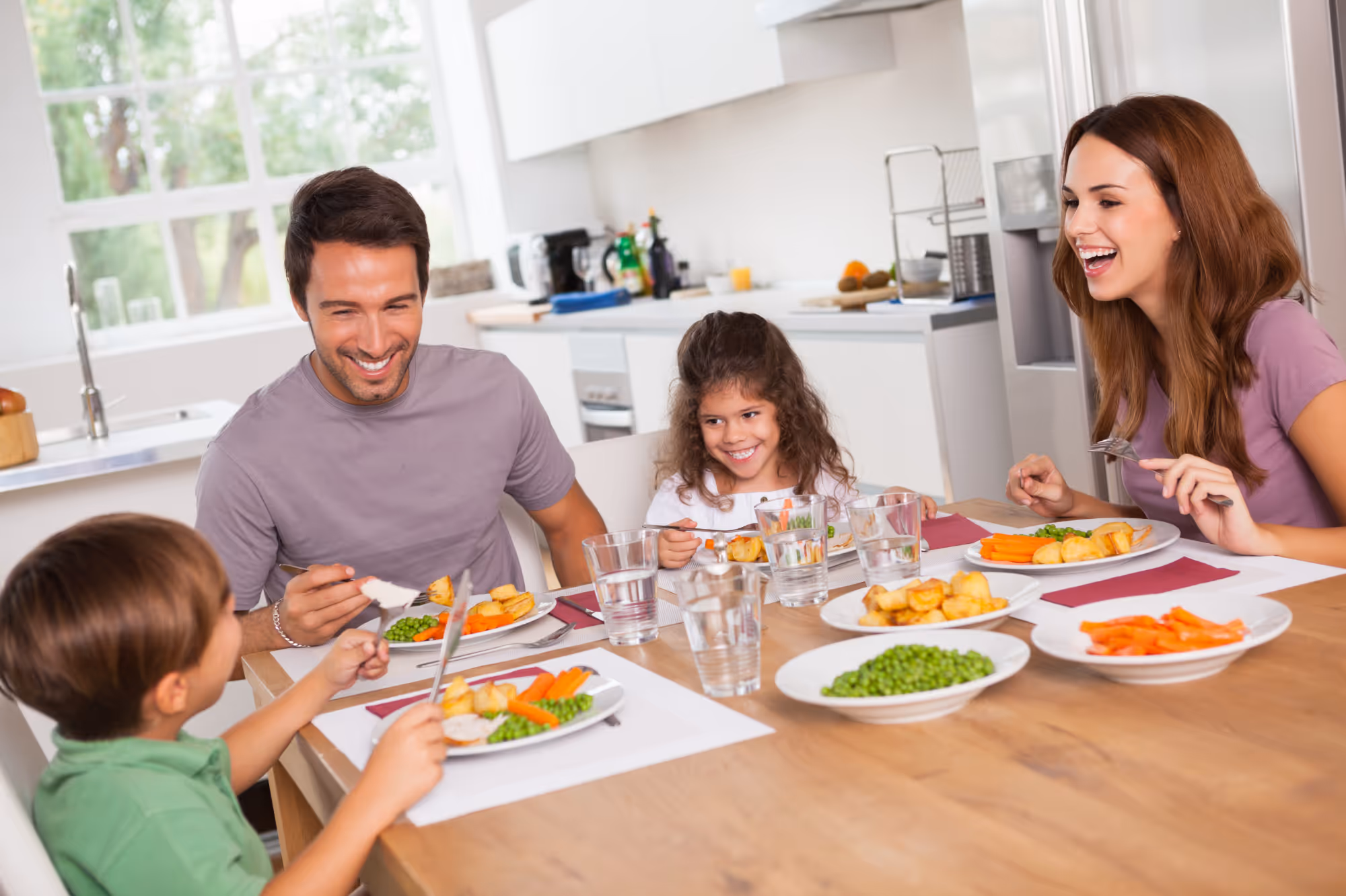 Family at dinner table.