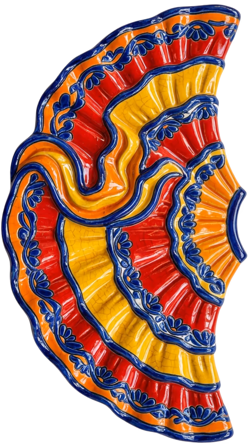 Colorful ceramic Mexican folkloric dress plate with red, yellow, orange, and blue floral patterns.